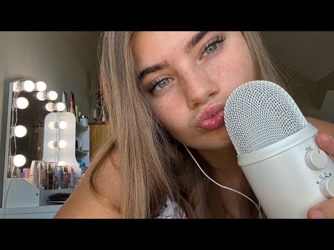 ASMR Inaudible whispering, mouth sounds, and hand movements.