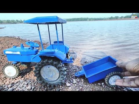 mini Tractor parle g biscuits loading stuck in mud help mini swaraj Tractor |  jcb video
