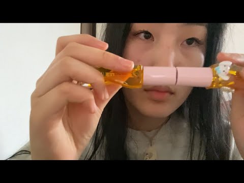 asmr silently reviewing lip products.