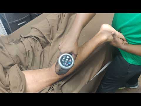 Calf Sports Massage with the Massage Gun and Ice Roller Ball