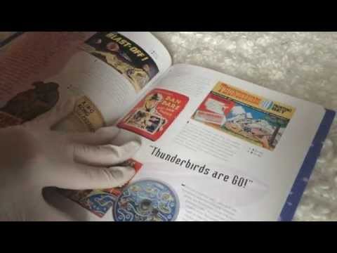 Latex Gloved Hands  page through a Fantasy Collectibles Book  [[ASMR]]