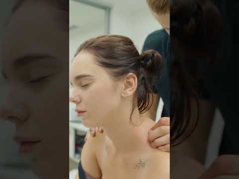 Shoulders Massage After Training for Fitness Model Nesty