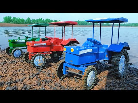 mini Swaraj tractor stuck in mud jcb Loading parle g biscuits help tractor Video