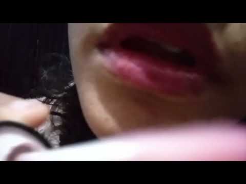 Asmr applying lipgloss with mouthsounds 