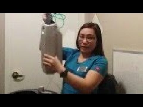 FILLING PORTABLE LIQUID OXYGEN:Igorot  in Denver Colorado.