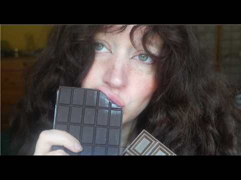 eating fake chocolate ASMR (whispers, mouth sounds, nibbling, biting)