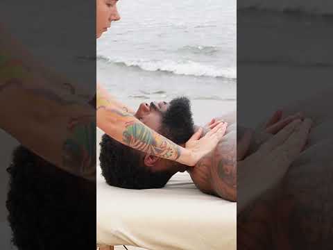 Shoulder massage on the beach