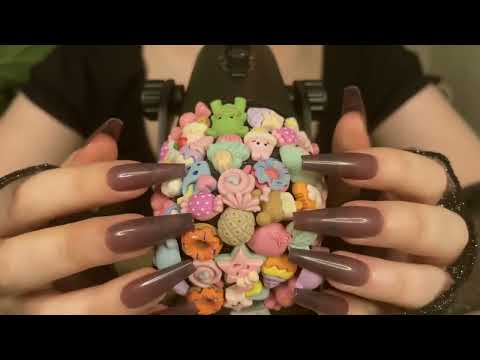 *one minute asmr* candy mic tapping & scratching (no talking)