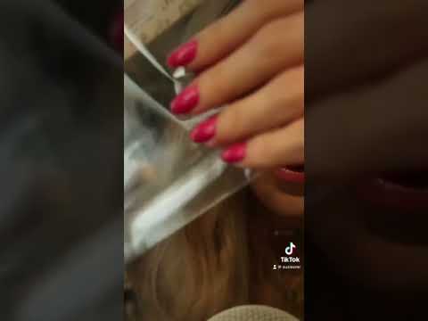 Plastic foil tapping. 🥰 Do we like? #asmr #whispering #asmrsounds #tapping