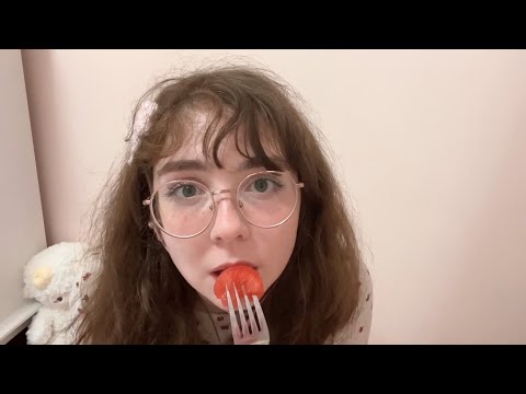 girl with messy hair eats watermelon and chicken tenders ASMR