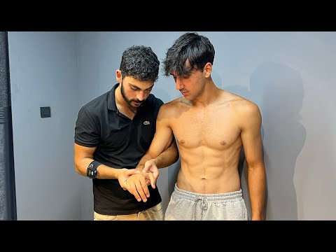 Football playsr model sport massage and perfect body relaxation