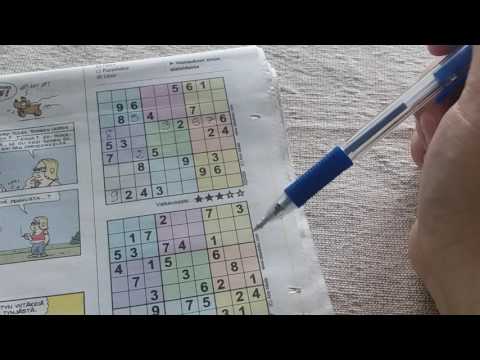 ASMR Finnish whispering ~ chewing gum ~ filling sudoku