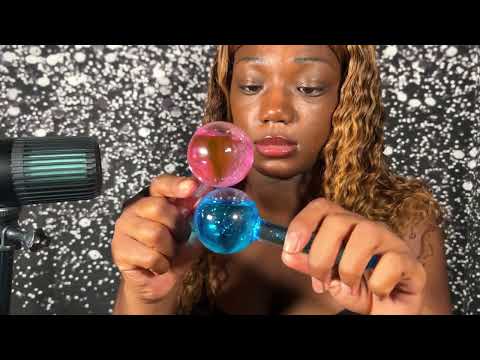 ASMR water globe trigger with @melanintongue407