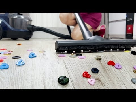Experiments with a vacuum cleaner. Is it possible to pick up buttons with a carpet brush?