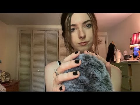 asmr—semi-inaudible whispering and mic fluffing