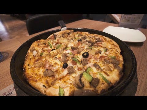 16 Euro di "PIZZA SUPER SUPREME" in Cina
