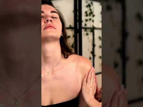 Karen and Lea focus on back massage techniques, their hands working in harmony to ease tension. The