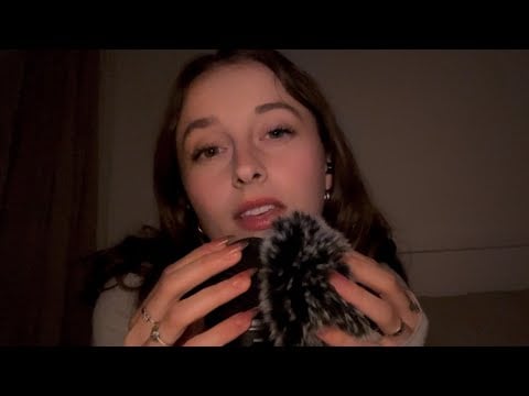 ASMR slow whispers, mouth sounds, mic scratching (bare/fluffy), personal attention in low light