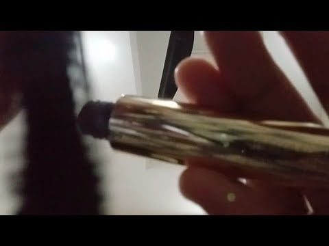Asmr mouthsounds  while applying multiple layers of mascara 
