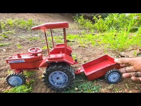 mini Swaraj tractor stuck in mud jcb Loading parle g biscuits help tractor Video