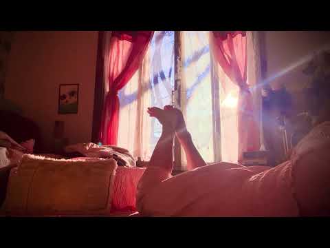 ASMR bare feet in the pose whispering reading and sun