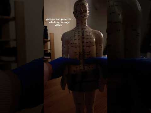 giving my acupuncture doll a FIZZY massage!!!
