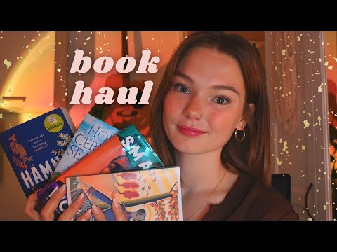 ASMR book haul! (whispered, tapping, gripping, page flipping u know the drill)