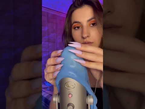 Asmr slime on microphone