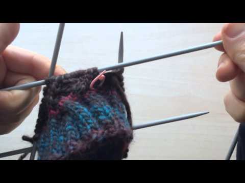 Knitting up close, counting, so many needles!