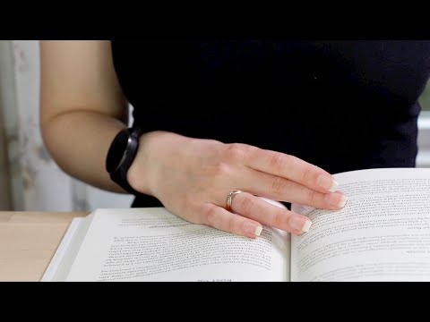 ASMR Whisper Unintelligible Book Page Turning