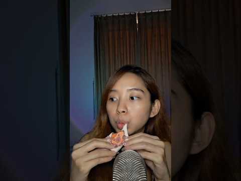 trying the marshmallow that i've bought from Kuala Lumpur