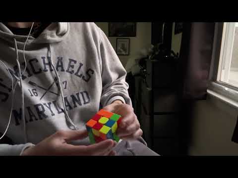 ASMR- Insane man talks to himself and solves a Rubik’s cube 