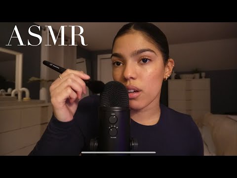 Repeating ASMR trigger words + mouth sounds, mic scratching, etc.