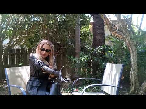 All over Leather in the Sun. Chilling out on a Summer's Day with Leather Gloves and a Cigar.
