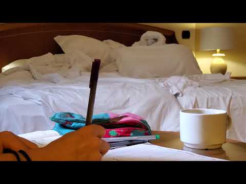 Ambient hotel room sounds while writing and softly speaking
