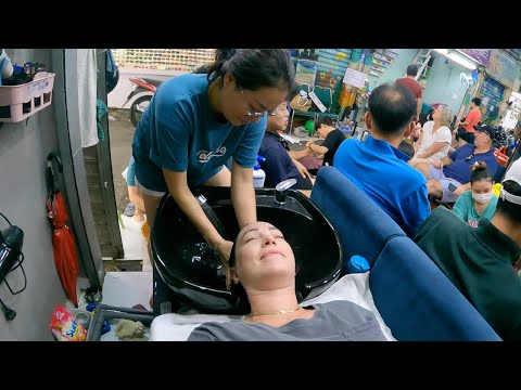 Masaje de cabello y oídos en un callejón de Vietnam: ¡solo 2 dólares!