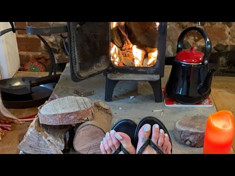 By the fire with whispers and toasty 🦶 and a little bit of fun in the hammock and a tree