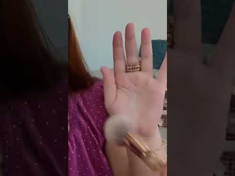 ASMR brushing my hand with a makeup brush and whispering